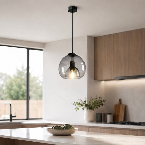 Glass pendant light in a styled kitchen