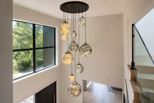 Double height entry with P410 glass globe cluster pendant